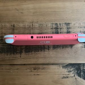 Nintendo Switch Lite (Pink) Comes with Mario Cart Inside